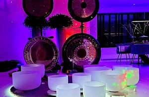 Sound bath experience at an event with crystal singing bowls creating deep relaxation and calm